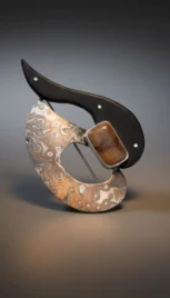 Broche 10 1, argent poli, mokumé gane, bois d'ébène et agathe resultat