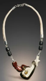 Collier 2 1, mariage des métaux (argent,laiton et cuivre) bois d'ébène, de padouk, os, corne de cerf et citrine resultat