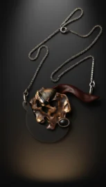 Pendentif 2 2, argent fusionné, bois de palissandre et de padouk et onix resultat